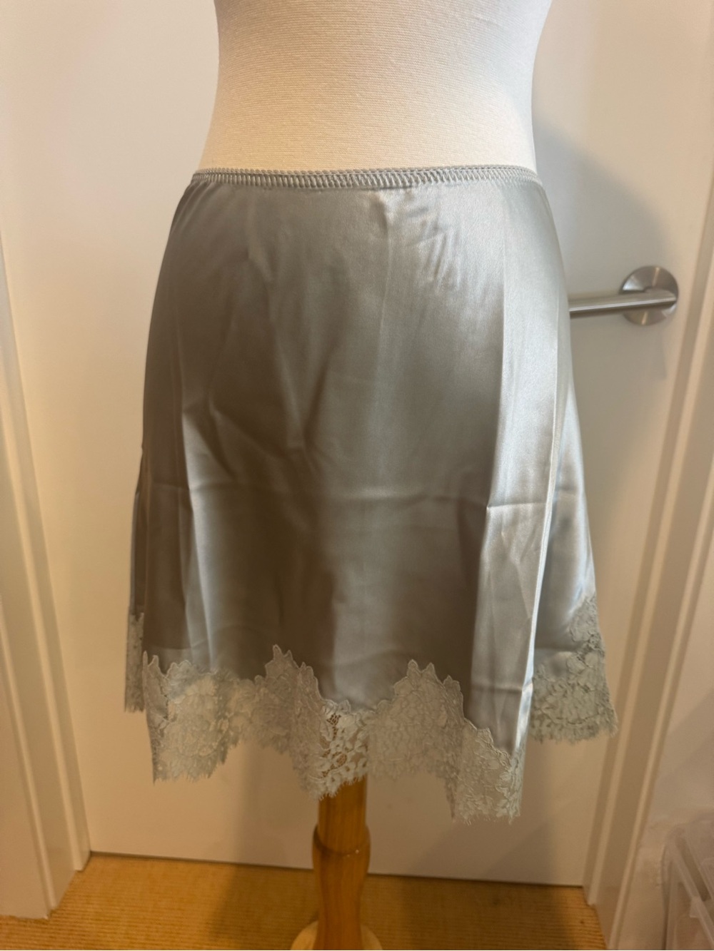 Doen Silk Lace Trim Slip Skirt in Light Teal./Gray color.